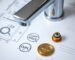A polished chrome faucet resting on international certification documents like cUPC and WRAS, symbolizing global compliance.